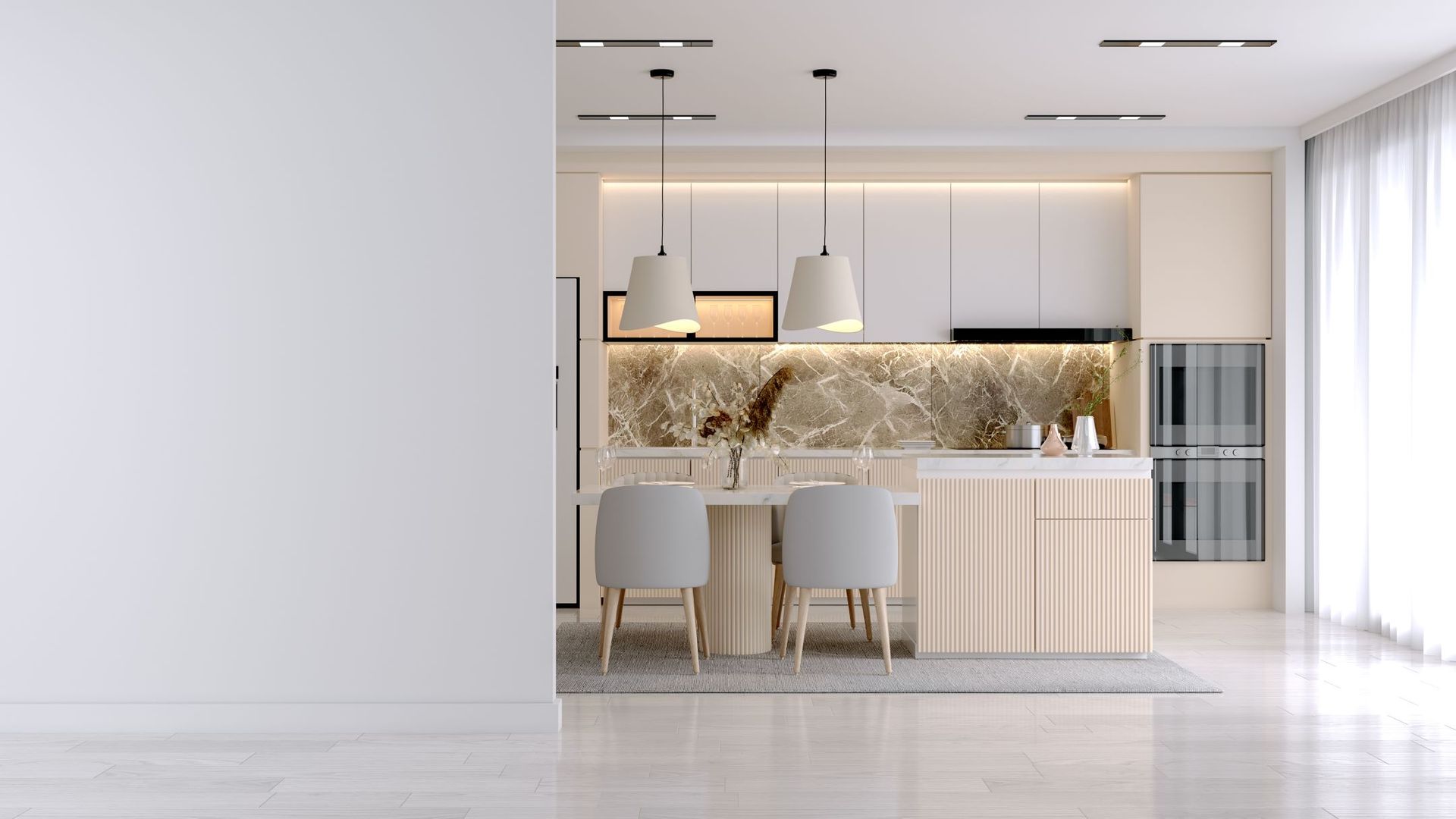 A modern kitchen with white cabinets , a wooden island , a table and chairs.